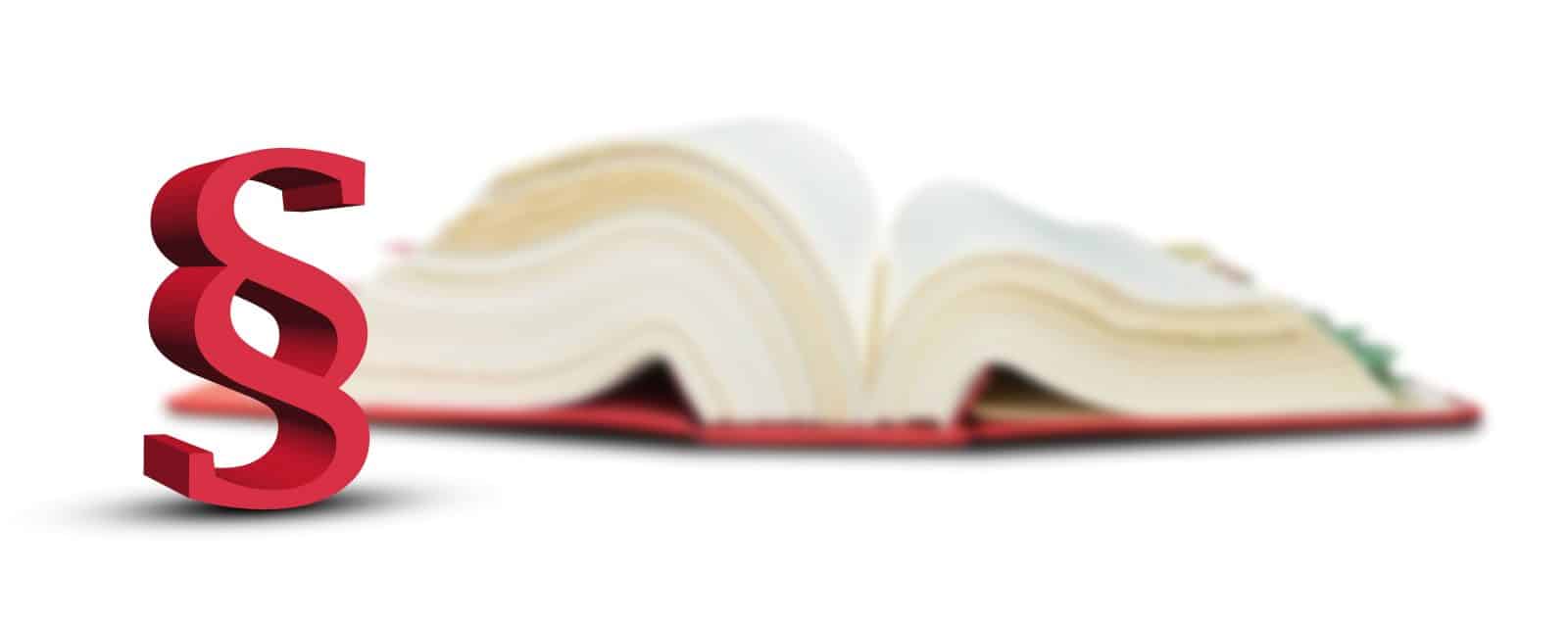 paragraf-symbol-vor-unscharfem-gesetzbuch arbeiten am feiertag